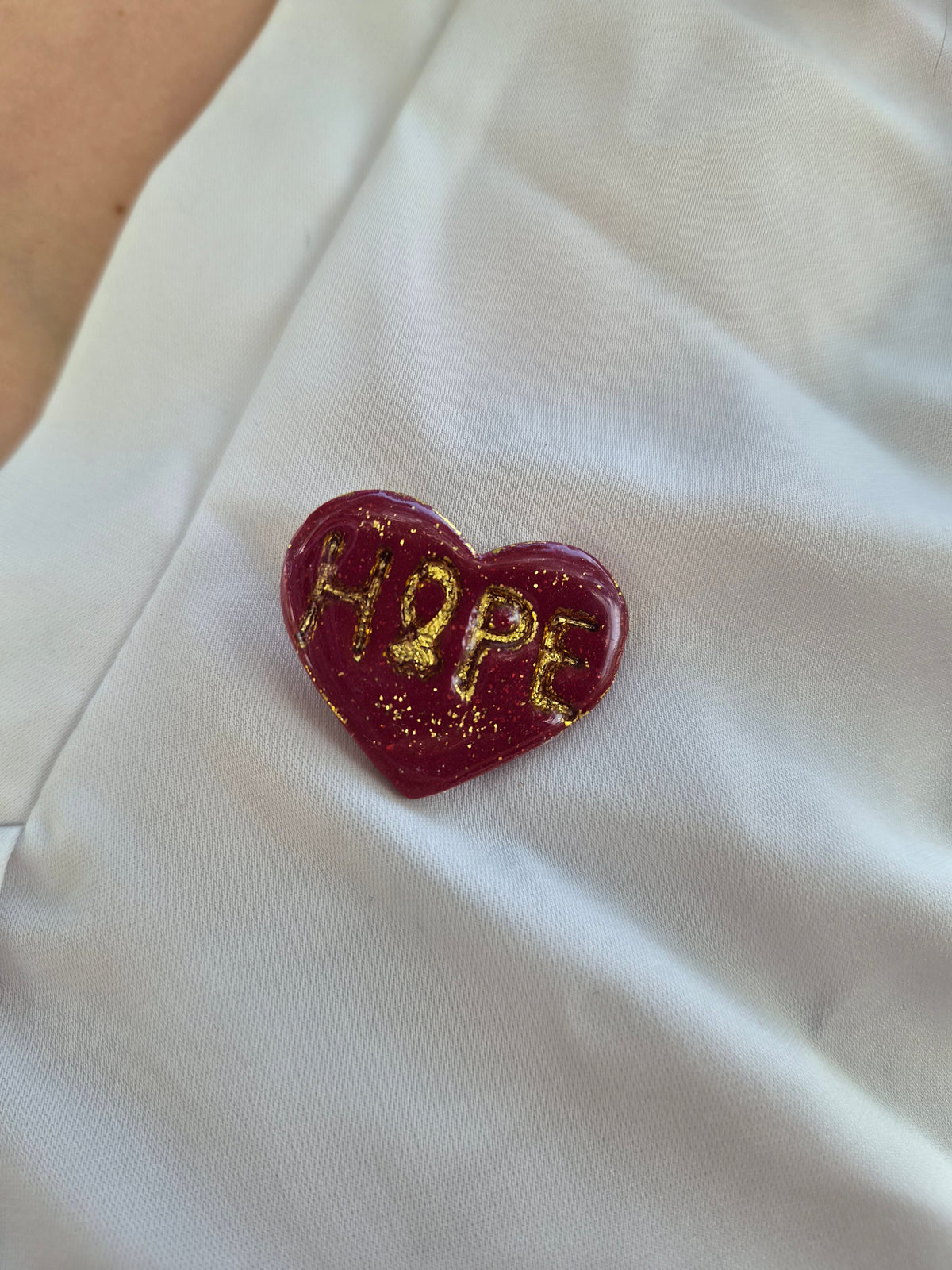 Pin's hope dorée